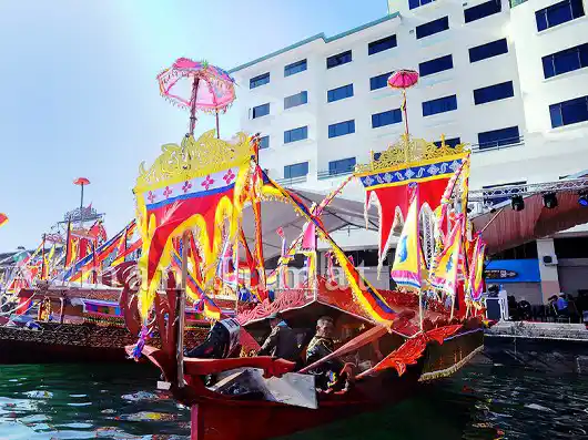 Vibrantly decorated traditional 'Lepa' boats gathered at the Semporna waterfront for the annual Regatta Lepa festival, celebrating local Bajau culture.