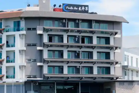 Modern facade of the Pacific Inn, a seafront resort hotel in Semporna offering comfortable accommodation for divers and travellers.